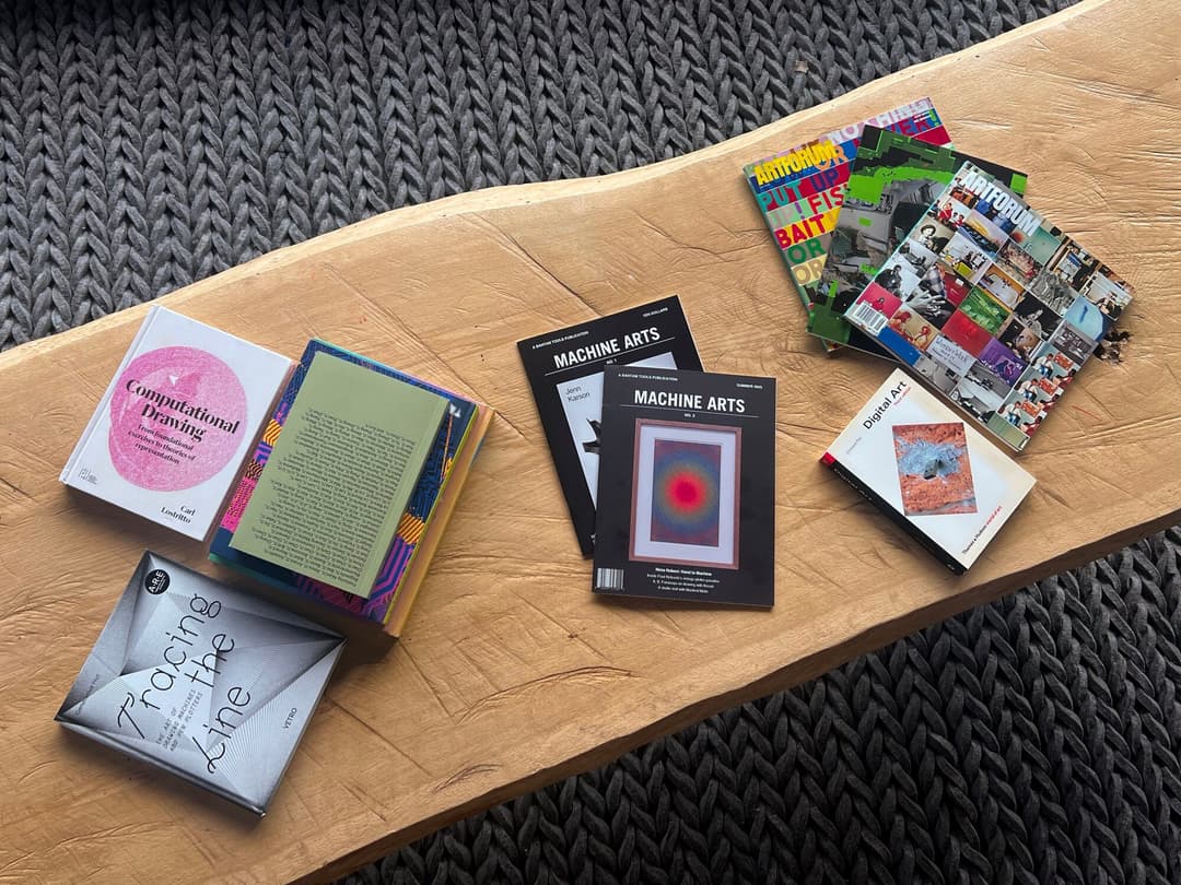 Machine Arts with plotted art on a table